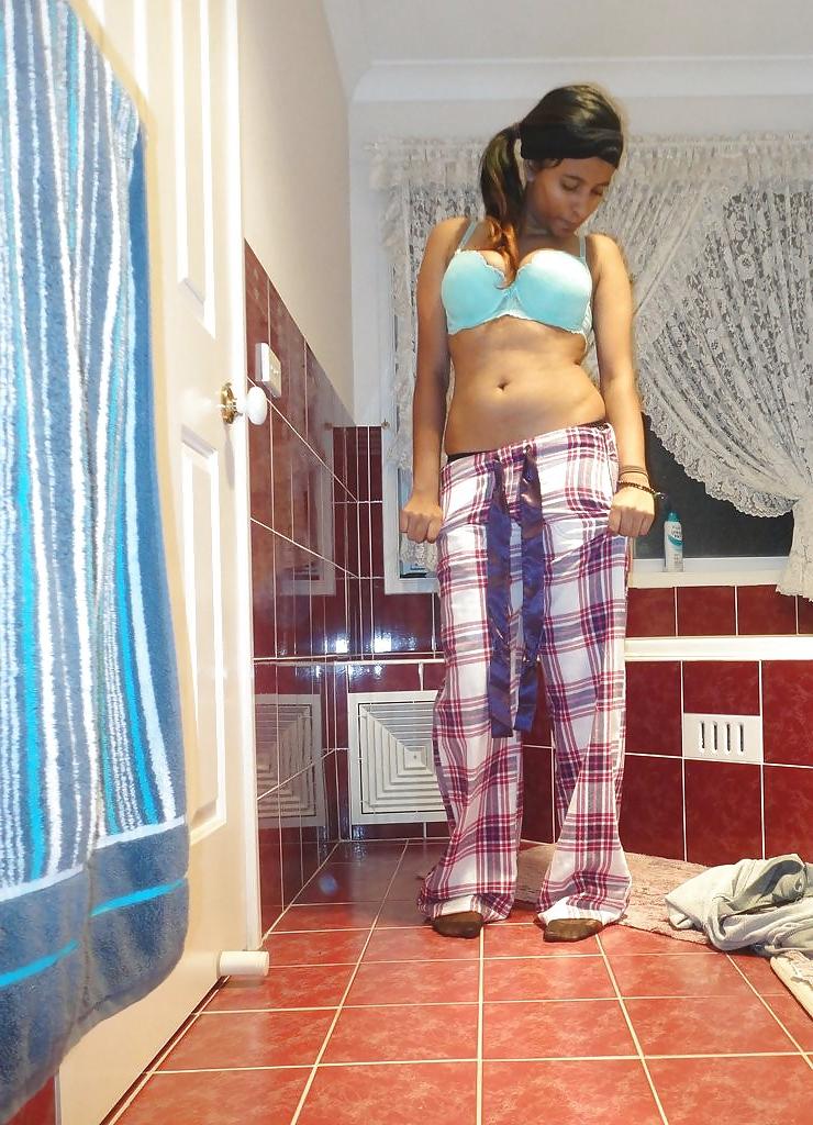 23P A Pakistani chick stripteasing in bathroom - selfshot