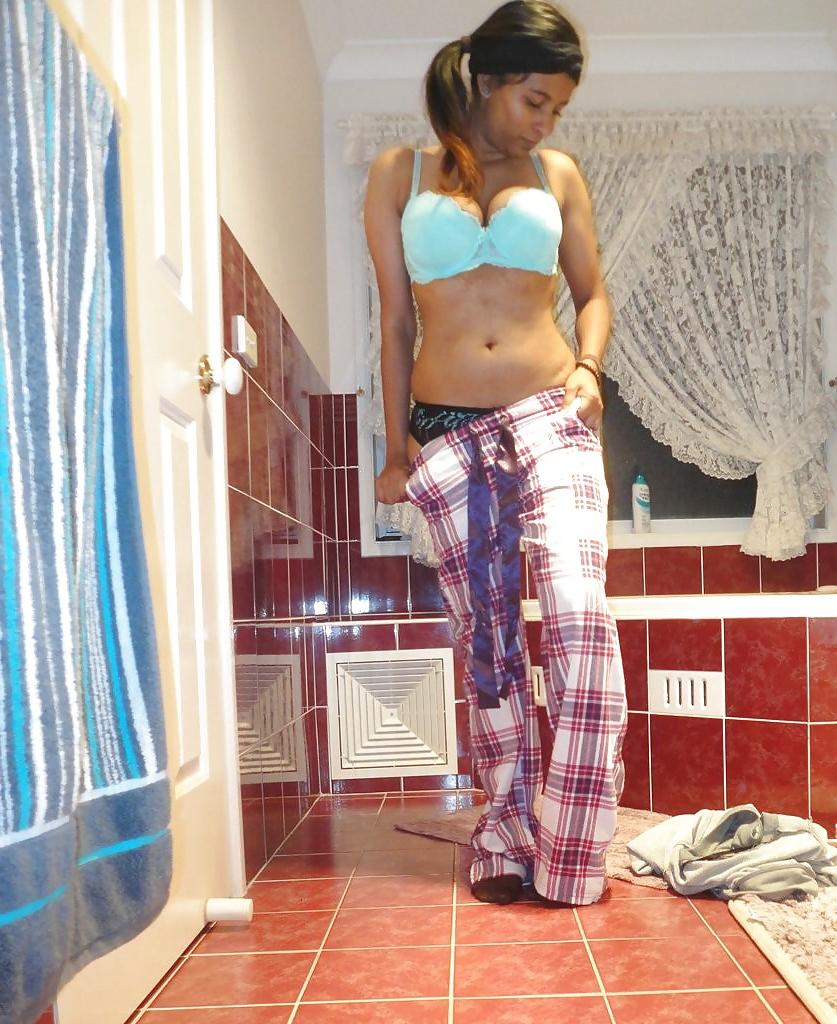 23P A Pakistani chick stripteasing in bathroom - selfshot