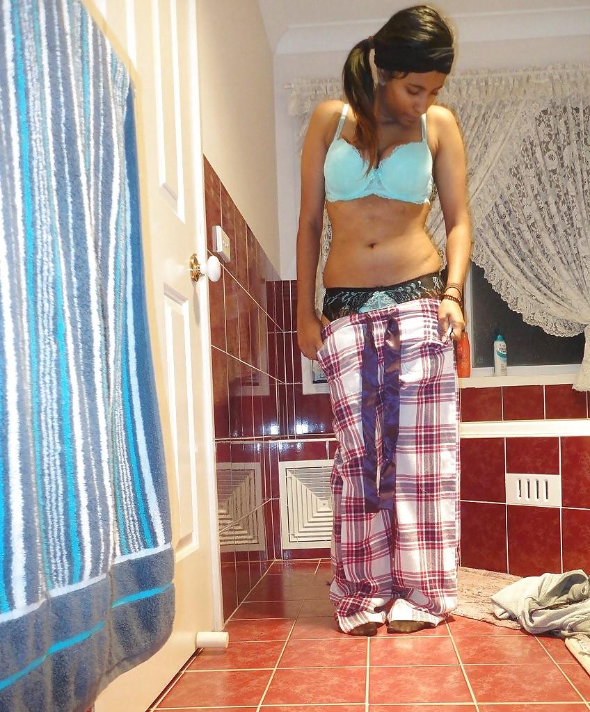 23P A Pakistani chick stripteasing in bathroom - selfshot