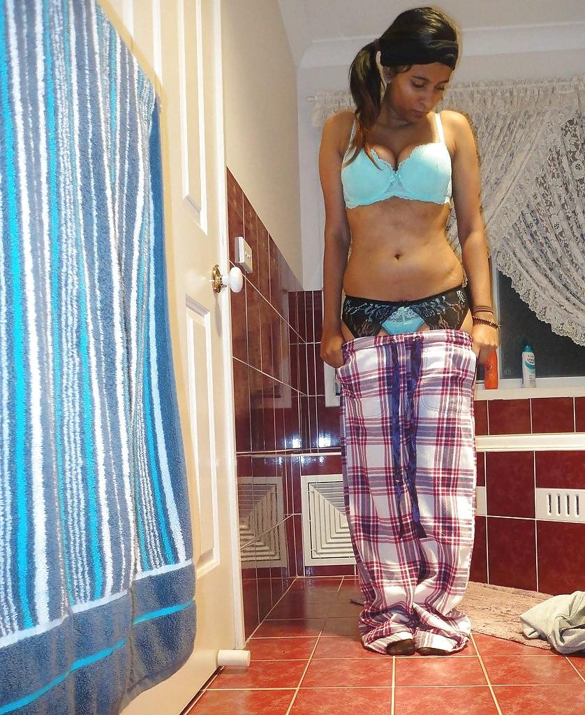 23P A Pakistani chick stripteasing in bathroom - selfshot