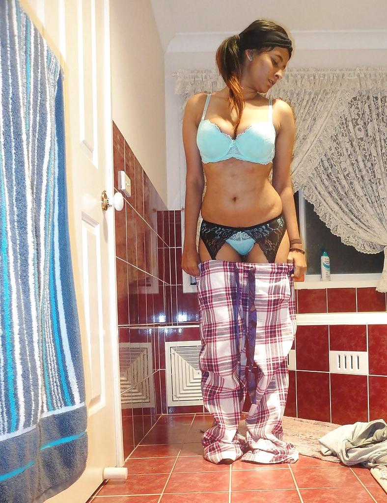 23P A Pakistani chick stripteasing in bathroom - selfshot