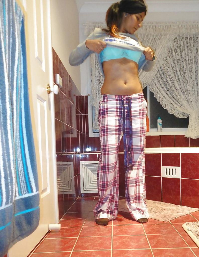 23P A Pakistani chick stripteasing in bathroom - selfshot