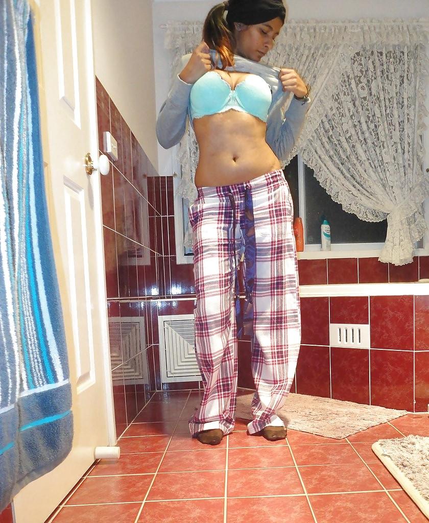 23P A Pakistani chick stripteasing in bathroom - selfshot