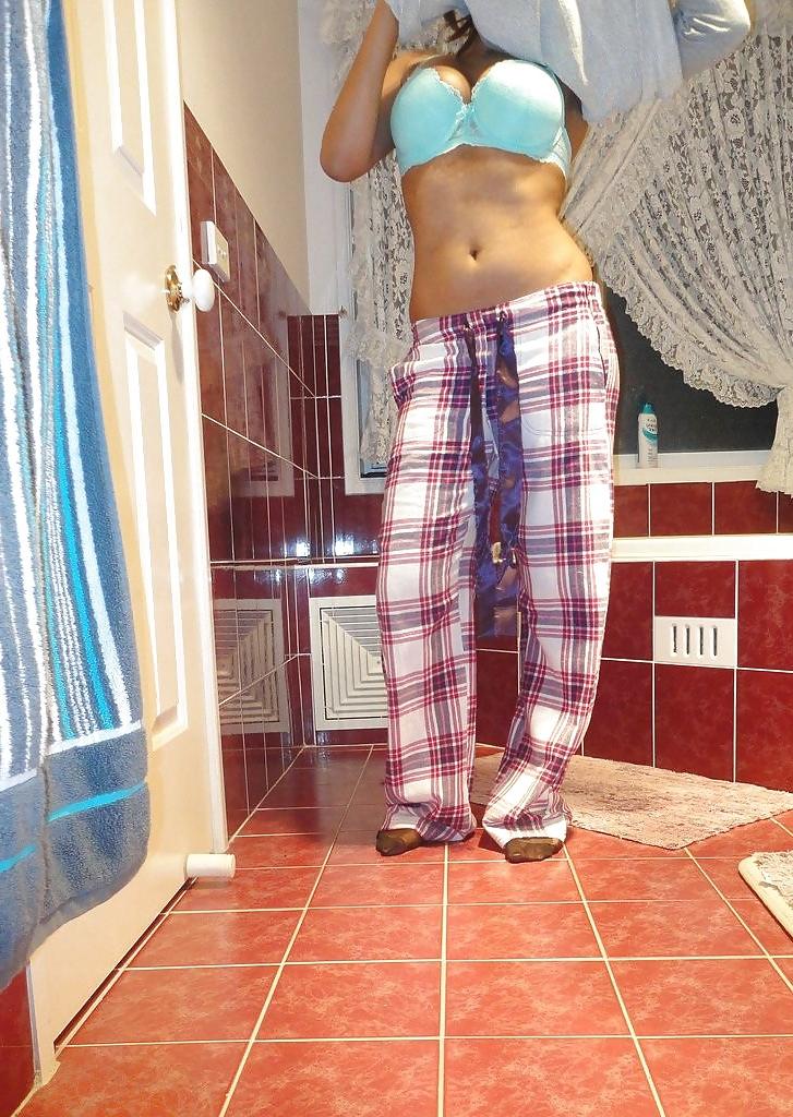23P A Pakistani chick stripteasing in bathroom - selfshot
