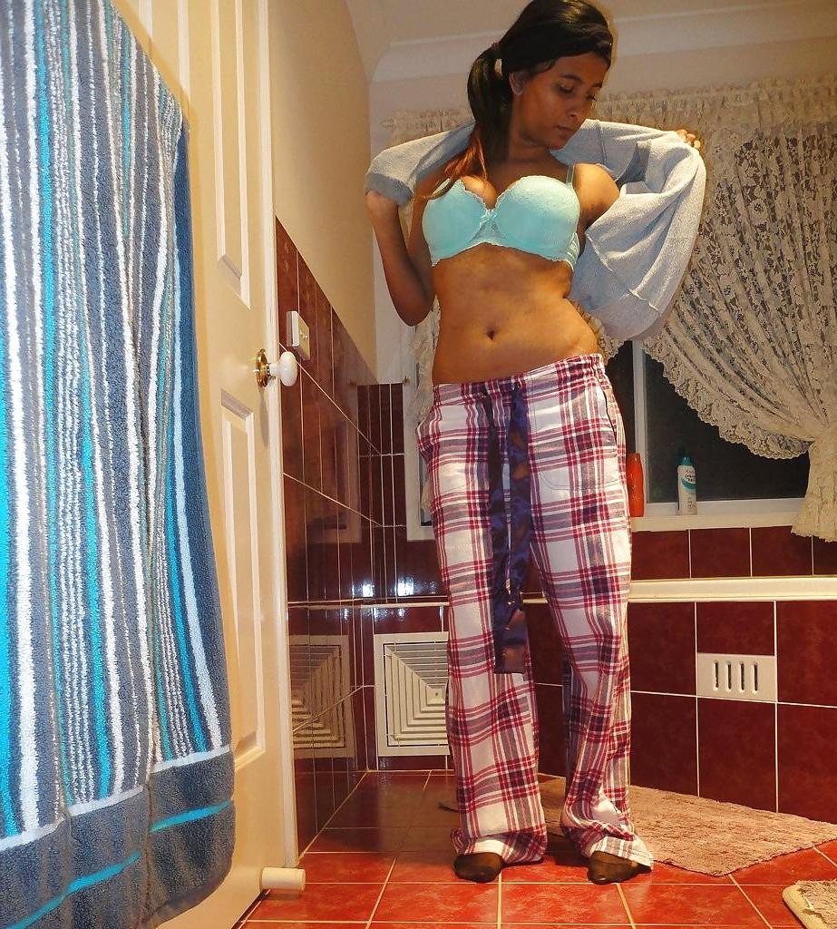 23P A Pakistani chick stripteasing in bathroom - selfshot