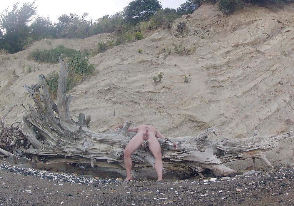 10P Naked, hard and stroking at the beach