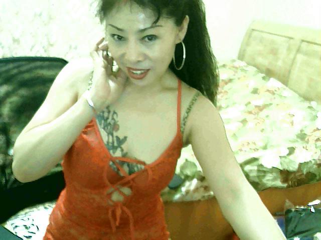 13P Chinese girl with a dragoon tattoo