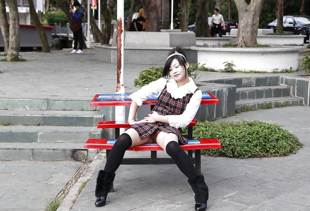 25P Chinese girl flashing pussy in public