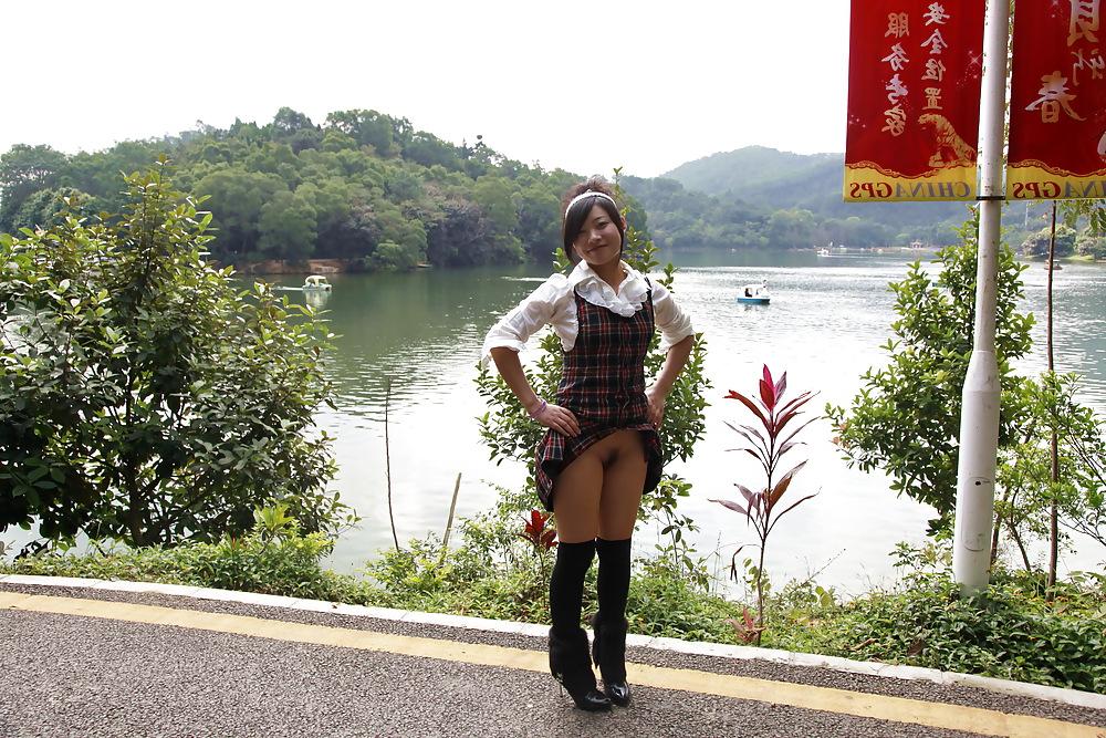 25P Chinese girl flashing pussy in public