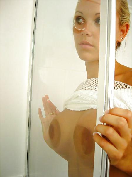 10P Amateur blonde showing off her nice rack