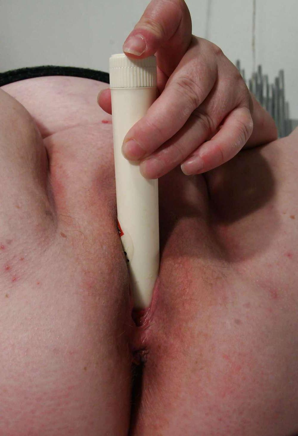 25P Fat ass granny Elze useing a white dildo