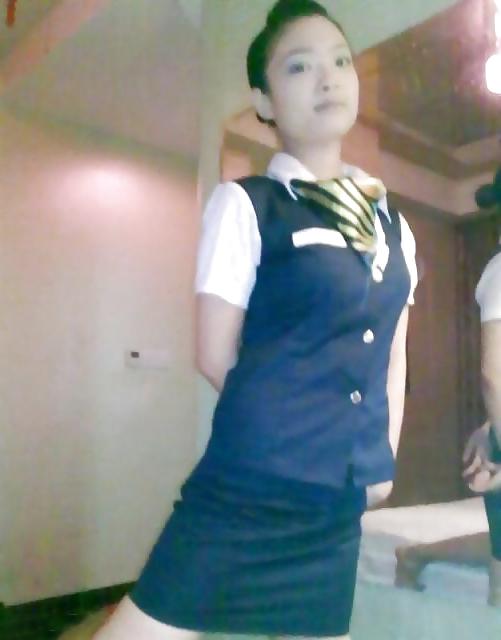 25P Chinese air hostess exposed