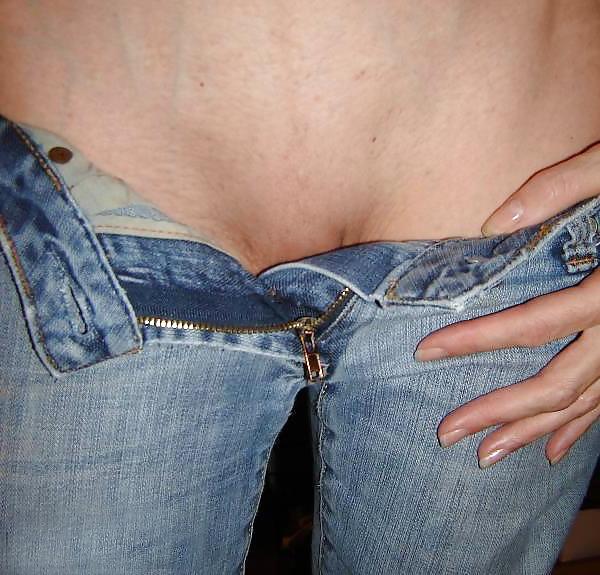 8P Stripping off her jeans
