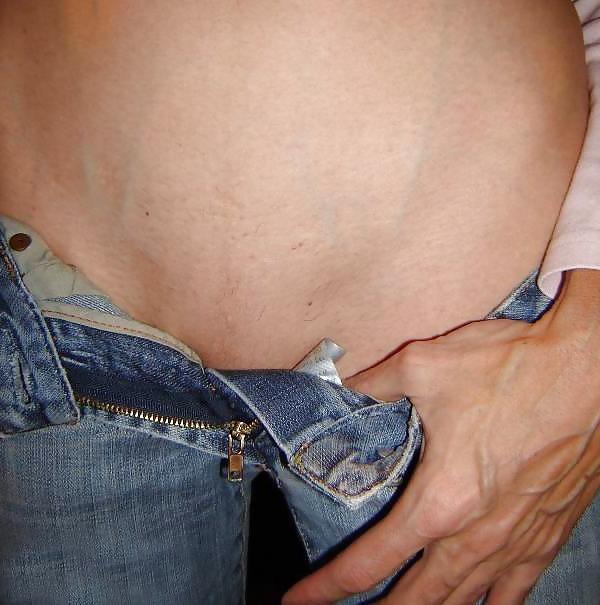 8P Stripping off her jeans