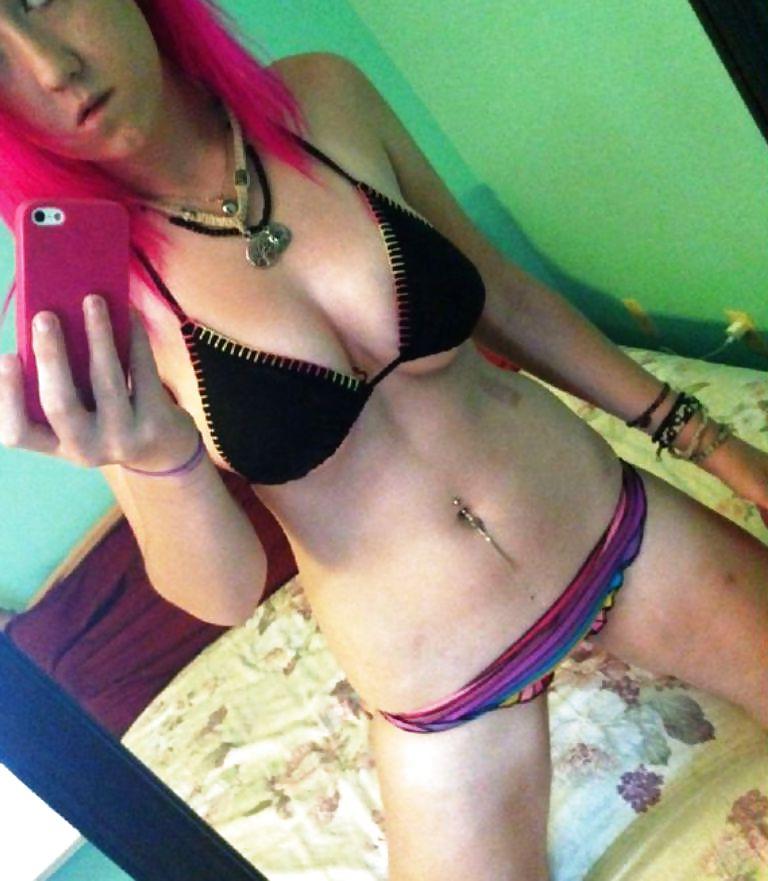 13P Selfshot of a sexy red-haired punk girl with big tits