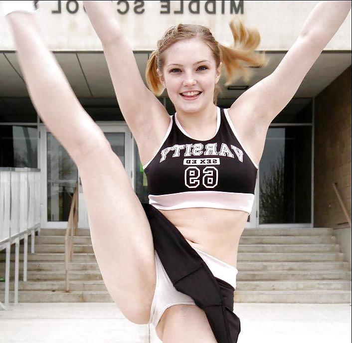 25P Cheerleader cuties with there legs wide apart. 