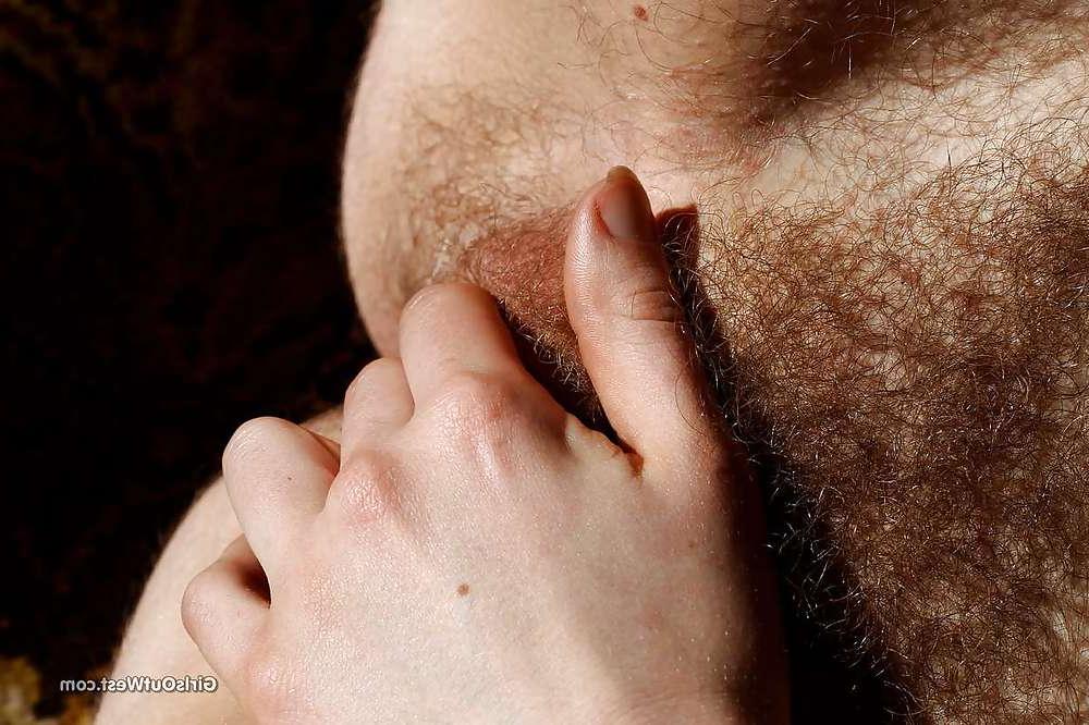 16P Curly amateur touching her hairy pussy