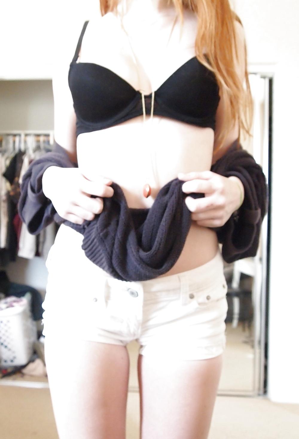 25P A charming 18-year-old red-haired girl