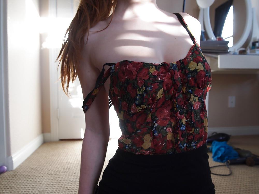 25P A charming 18-year-old red-haired girl