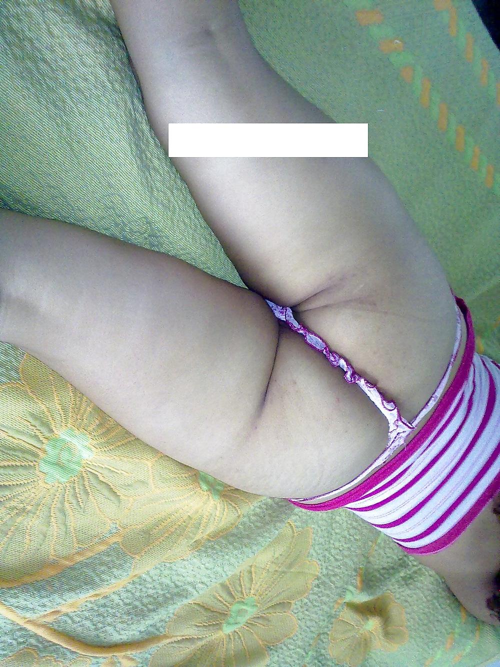 12P Latina mature showing off her ass and panty