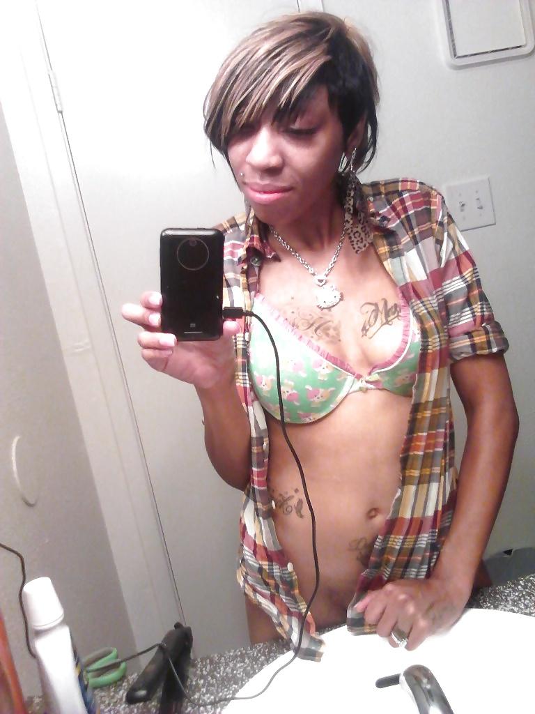 16P Monique shows off her tattoos in the bathroom