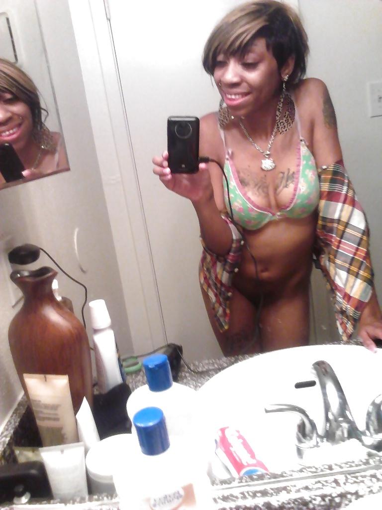 16P Monique shows off her tattoos in the bathroom