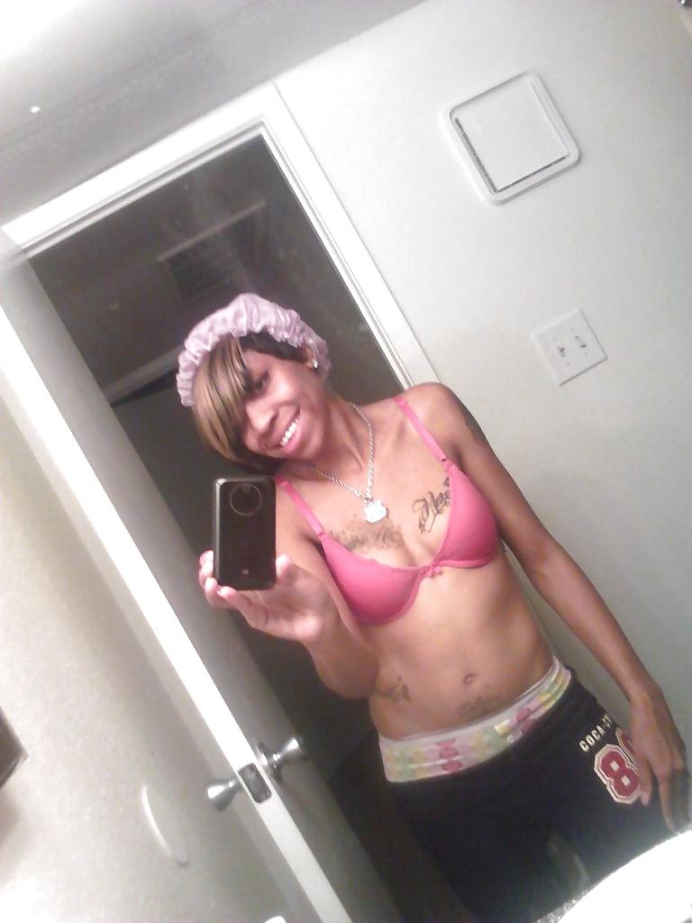 16P Monique shows off her tattoos in the bathroom
