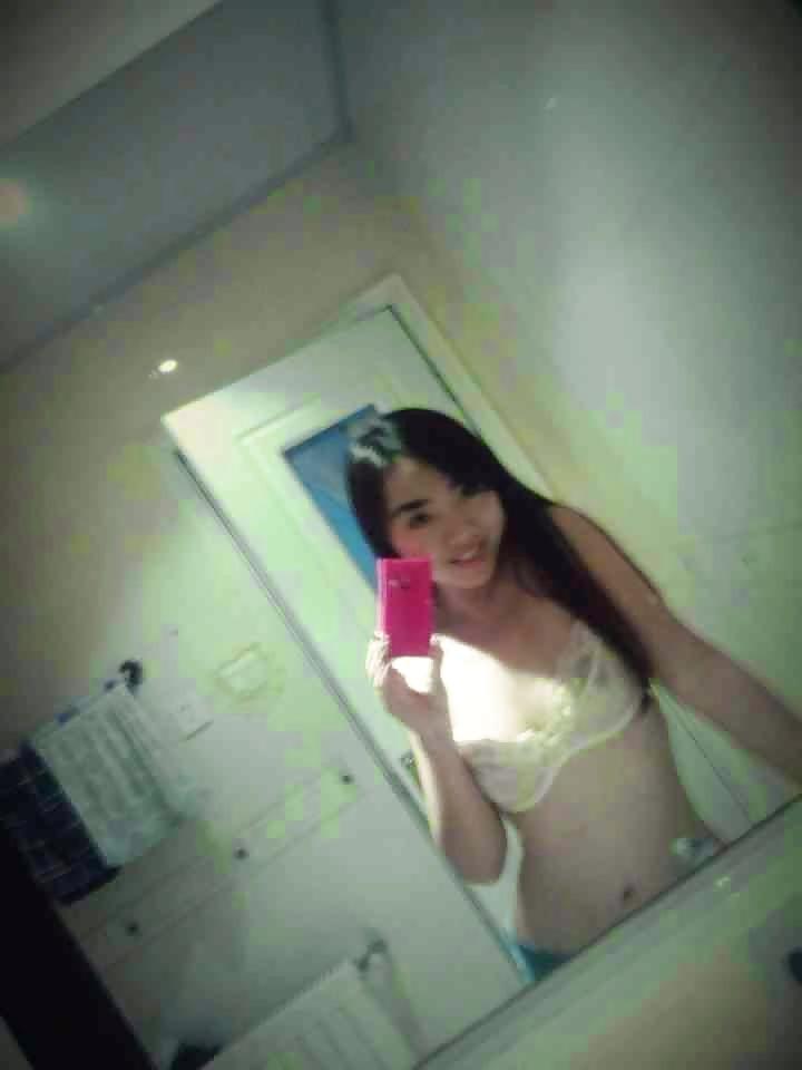 12P Chinese girl nude at home