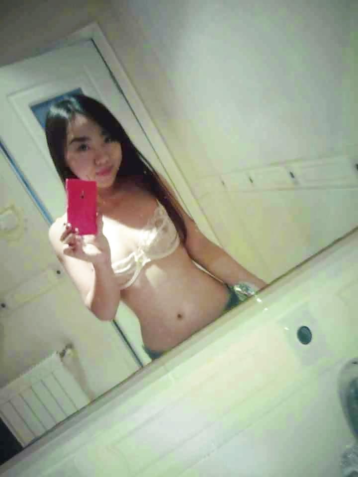 12P Chinese girl nude at home