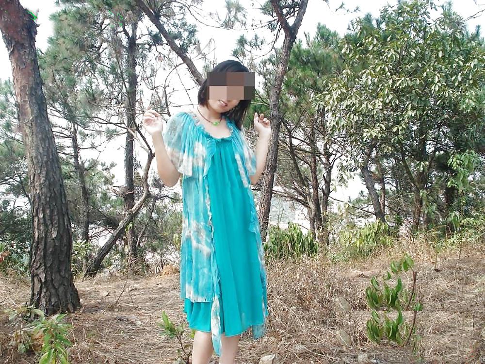 8P Chinese married girl undressed in the trees