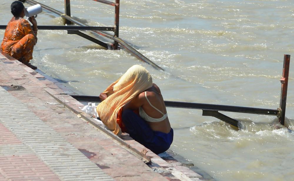14P Desi woman bathing