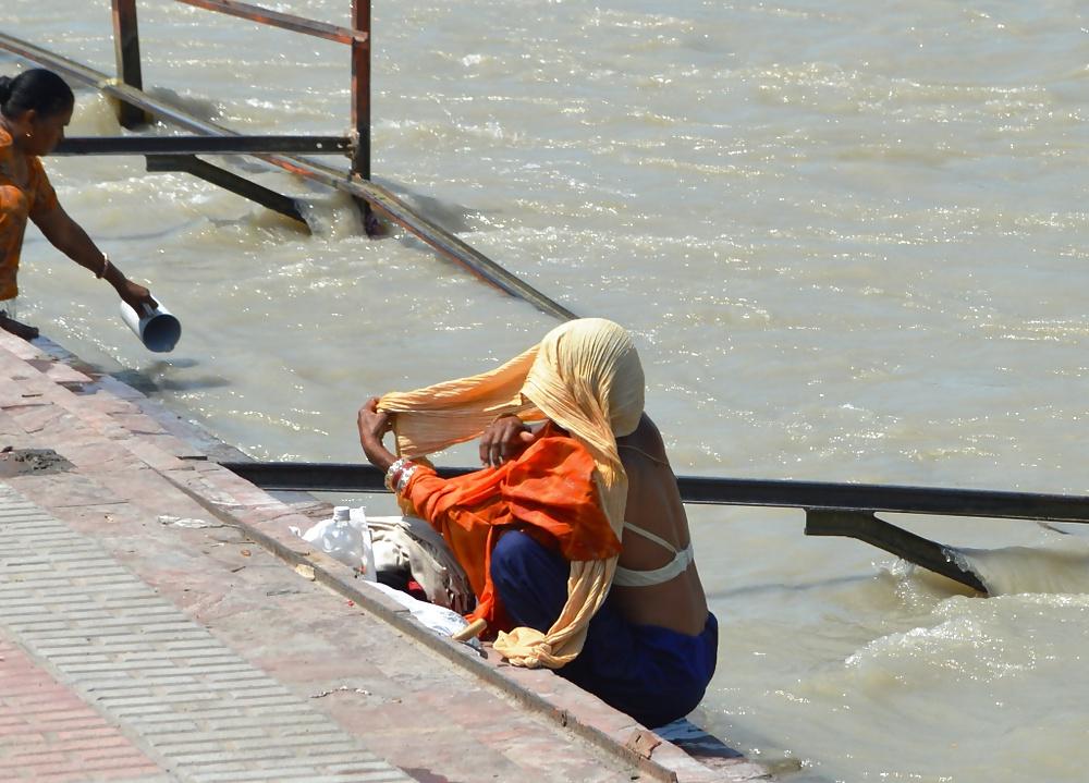 14P Desi woman bathing