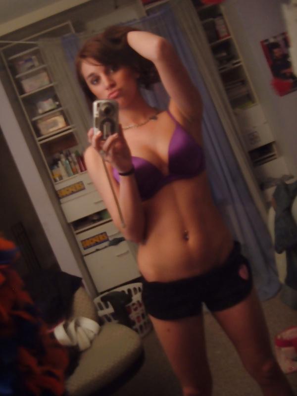 25P Hot teen strips in mirror