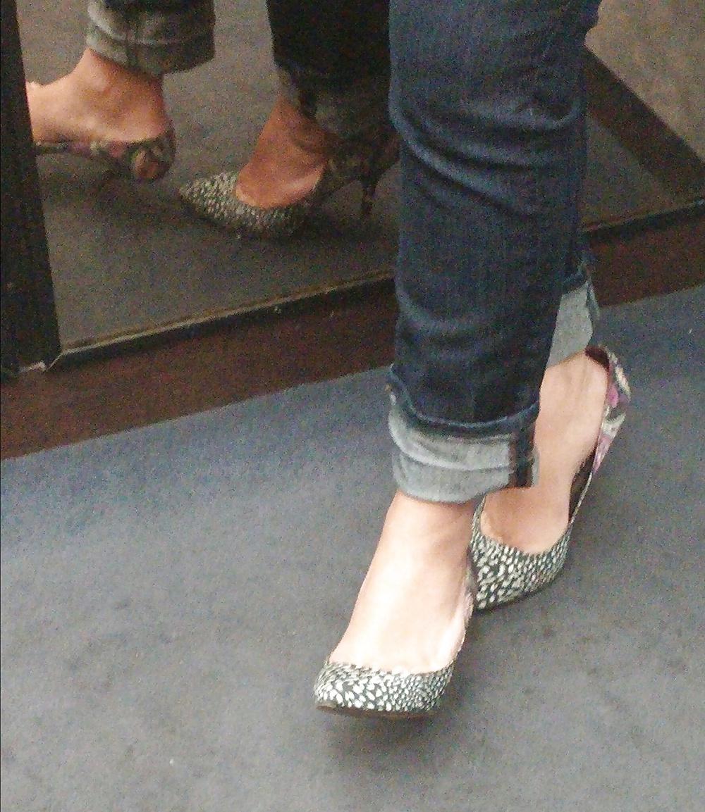 14P Sexy co-workers in jeans and heels 