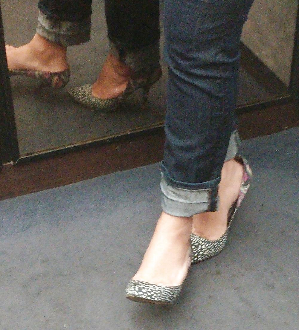 14P Sexy co-workers in jeans and heels 