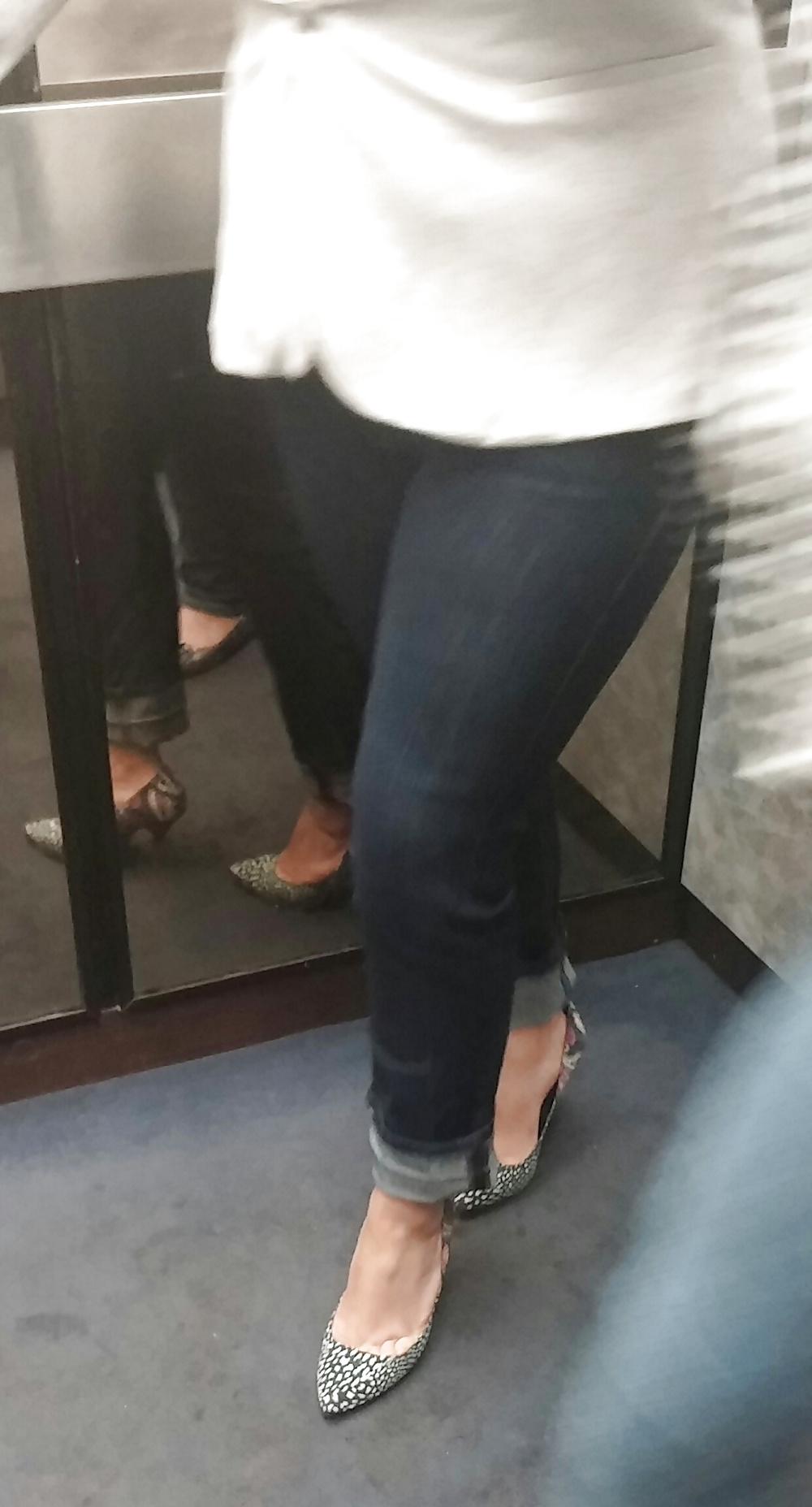 14P Sexy co-workers in jeans and heels 