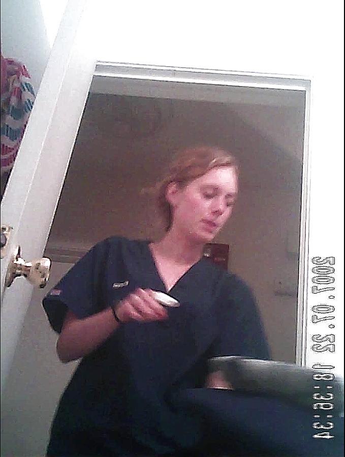 20P College blonde changing in bathroom