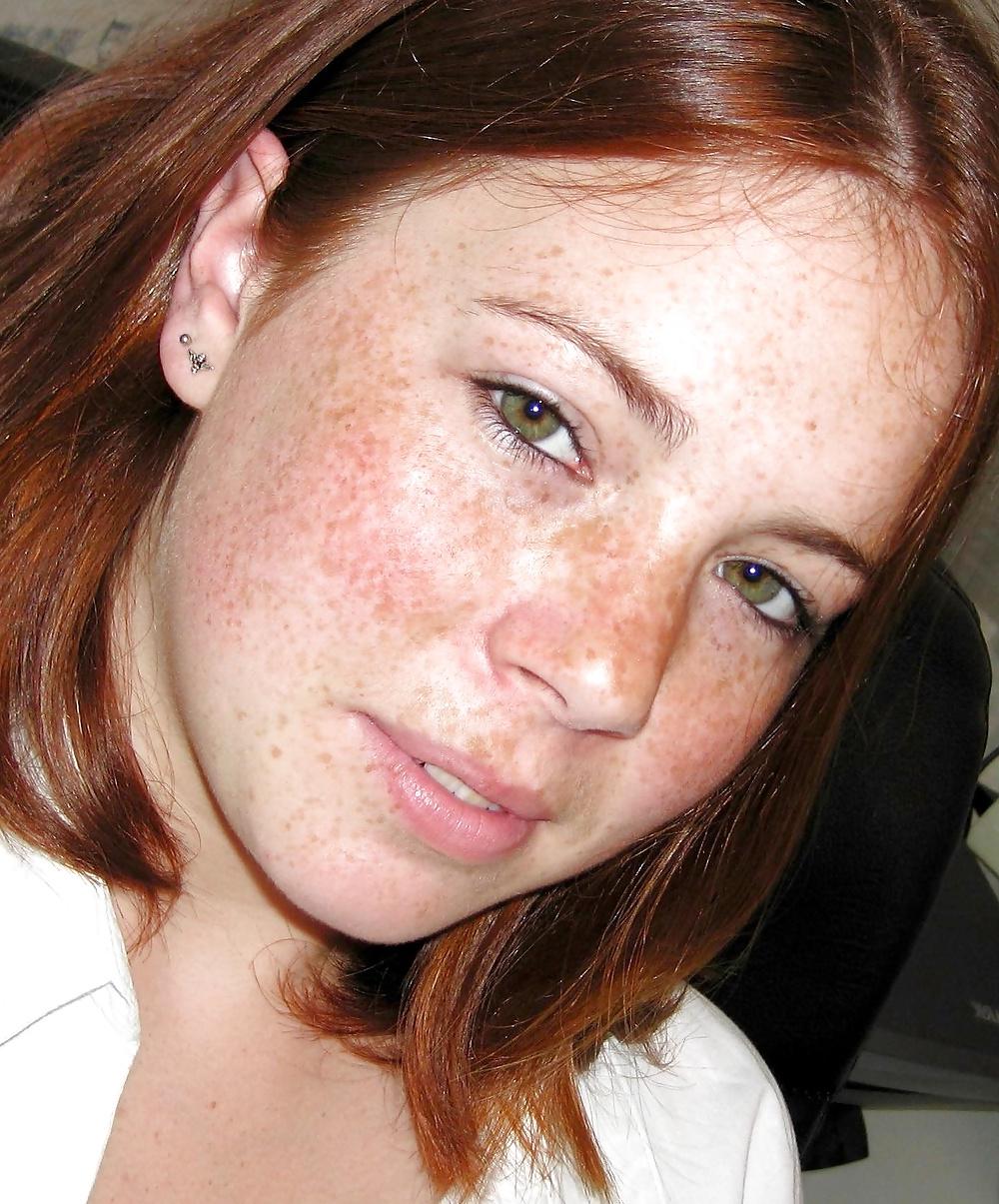 25P Redhead giving blowjob