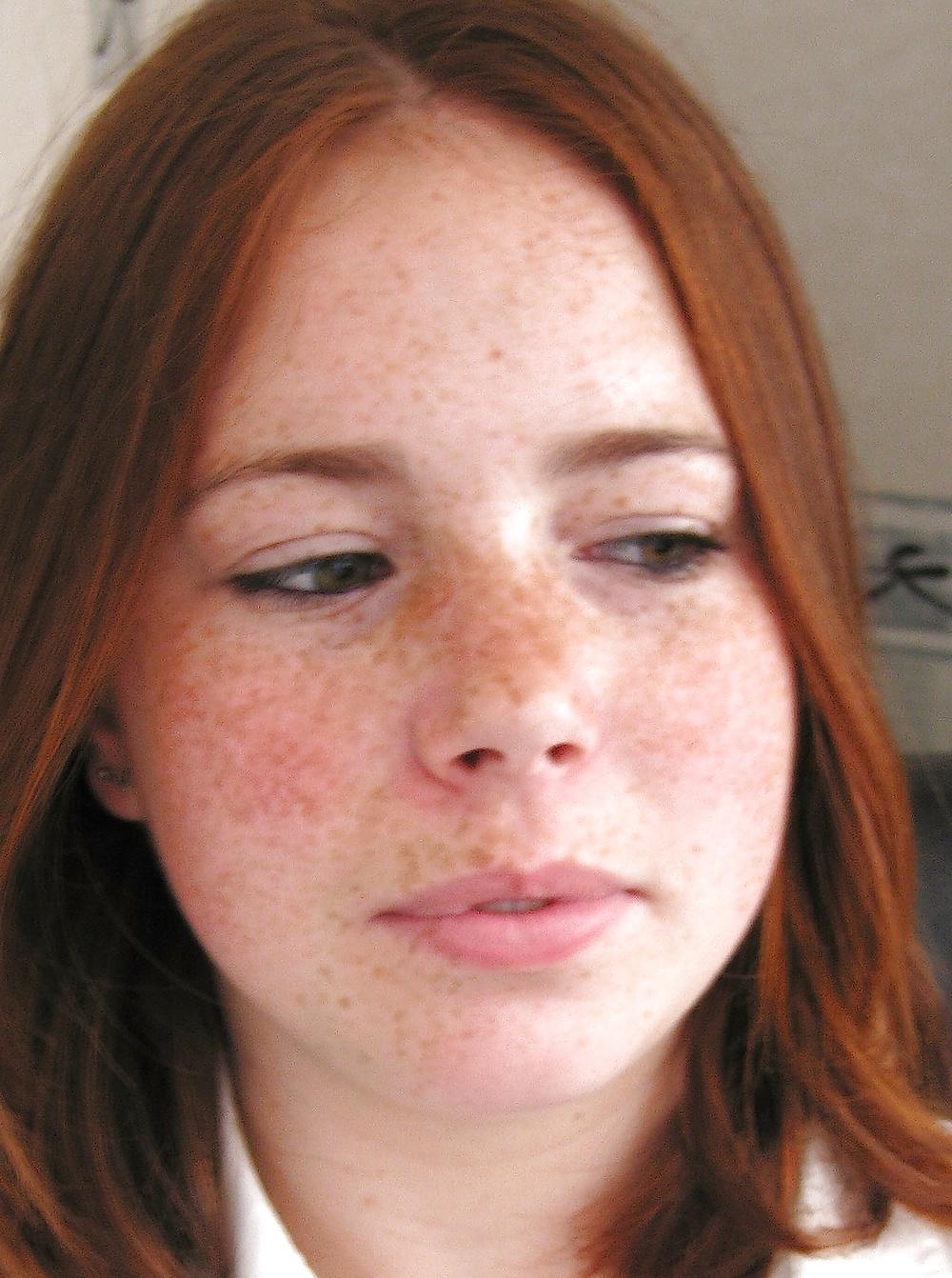 25P Redhead giving blowjob