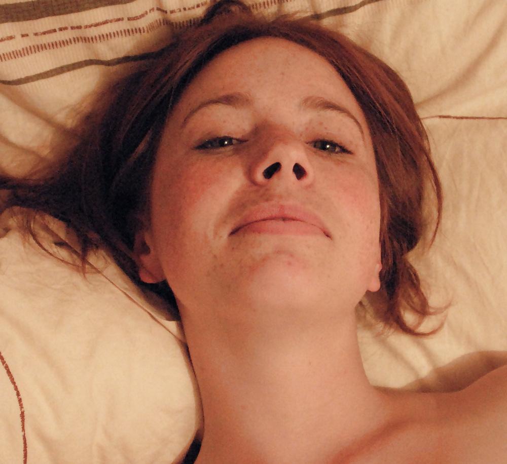 25P Redhead giving blowjob