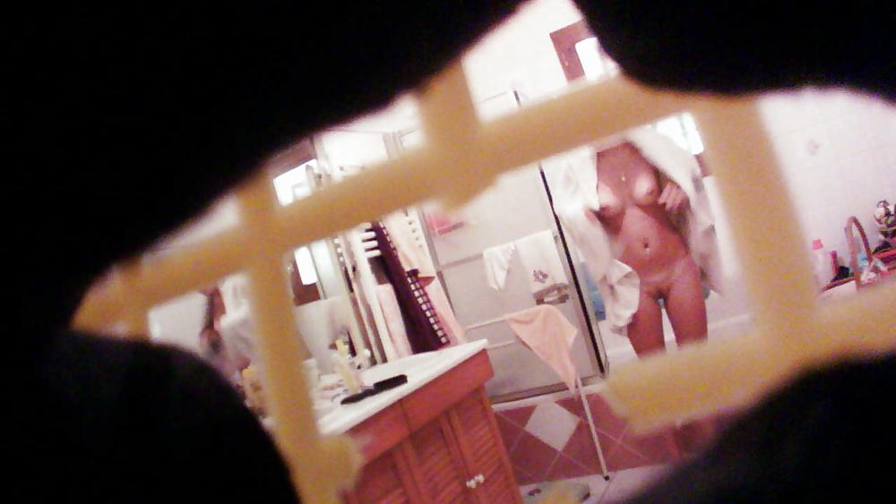 25P Hidden cam - Teen in bathroom