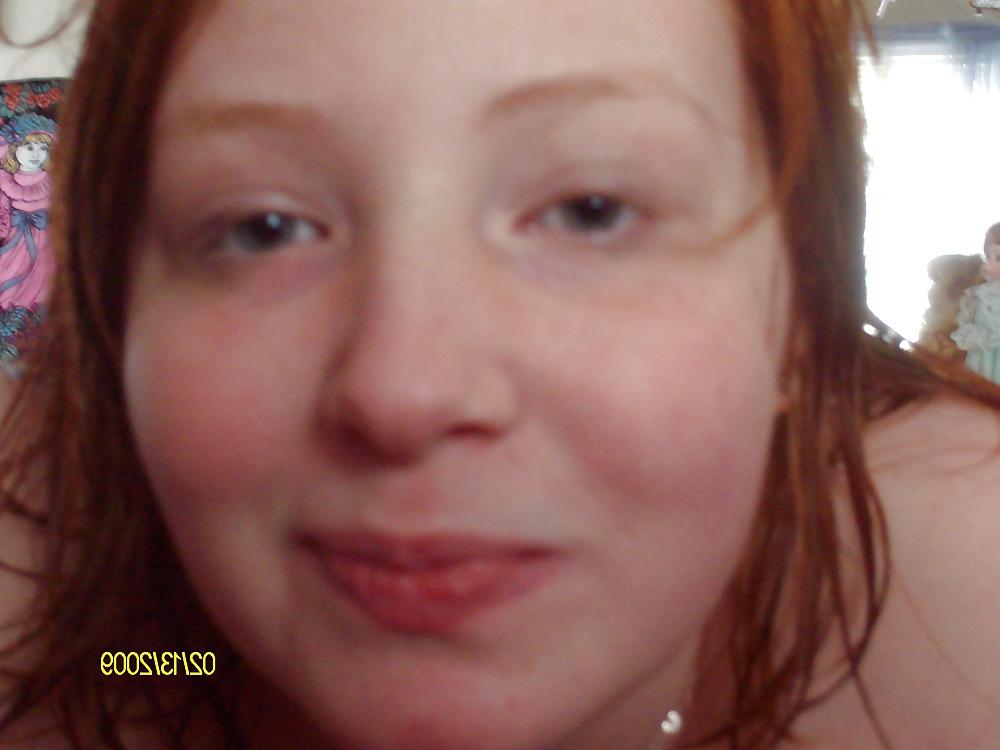 25P Cute Red Head Poses in her Messy Apartment 