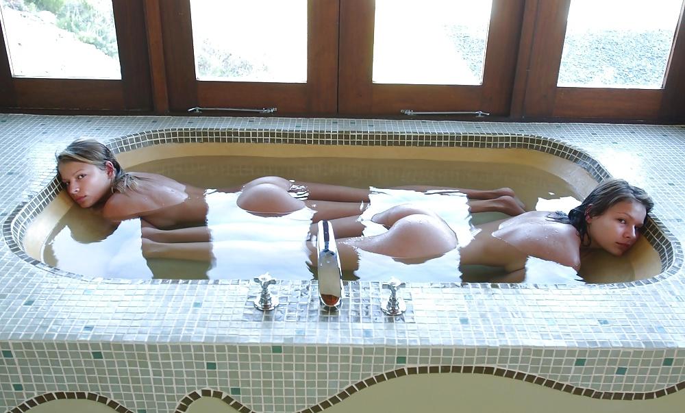 21P Two girls waking up and bathing together.