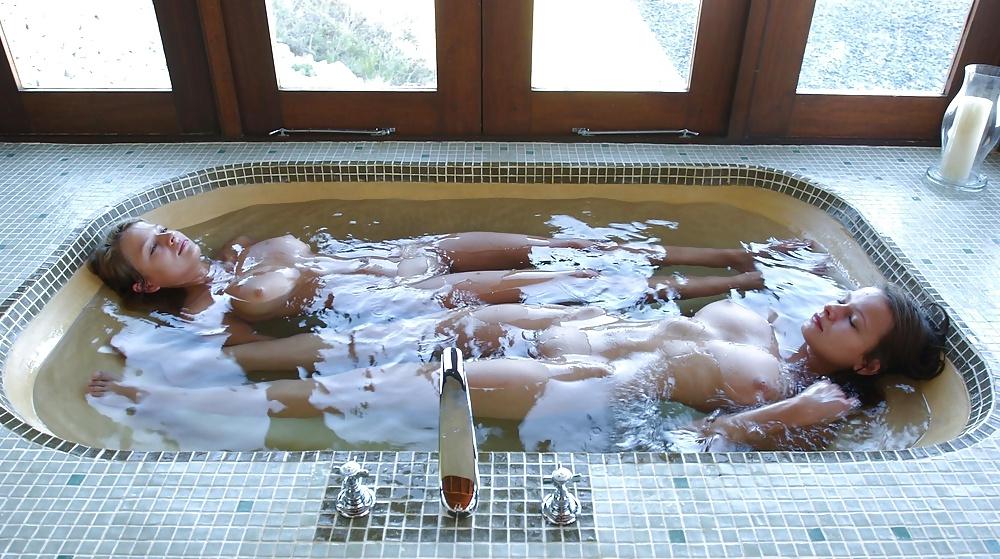21P Two girls waking up and bathing together.