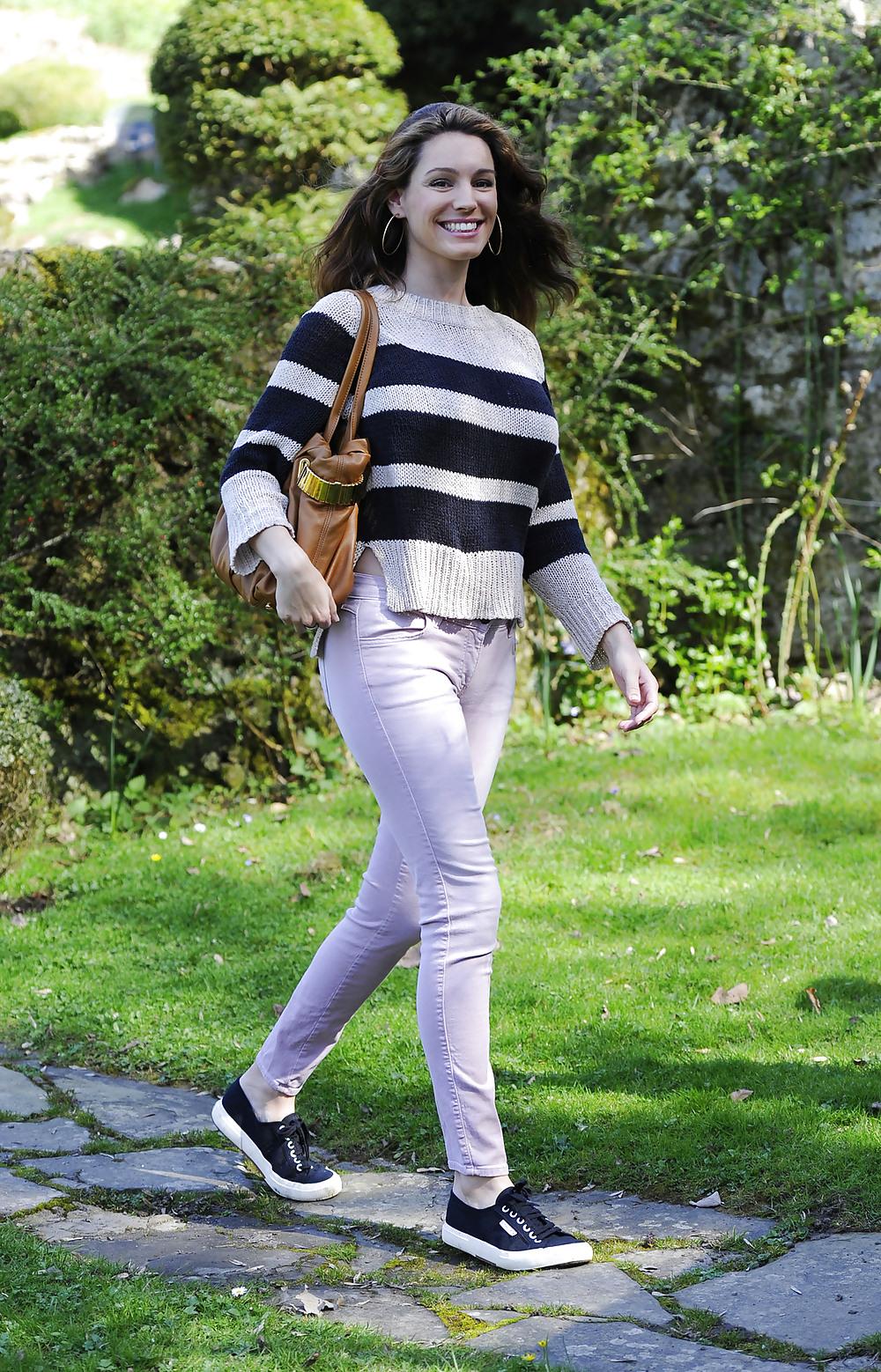 14P Pregnant Kelly Brook out and about in pink jeans London
