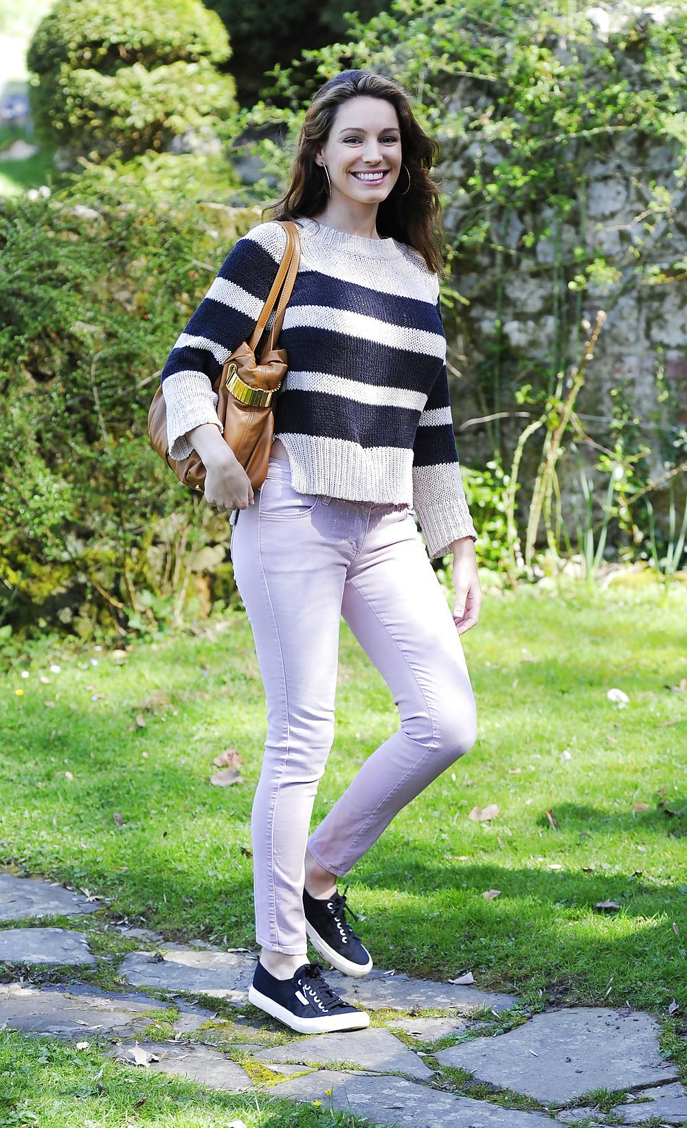 14P Pregnant Kelly Brook out and about in pink jeans London