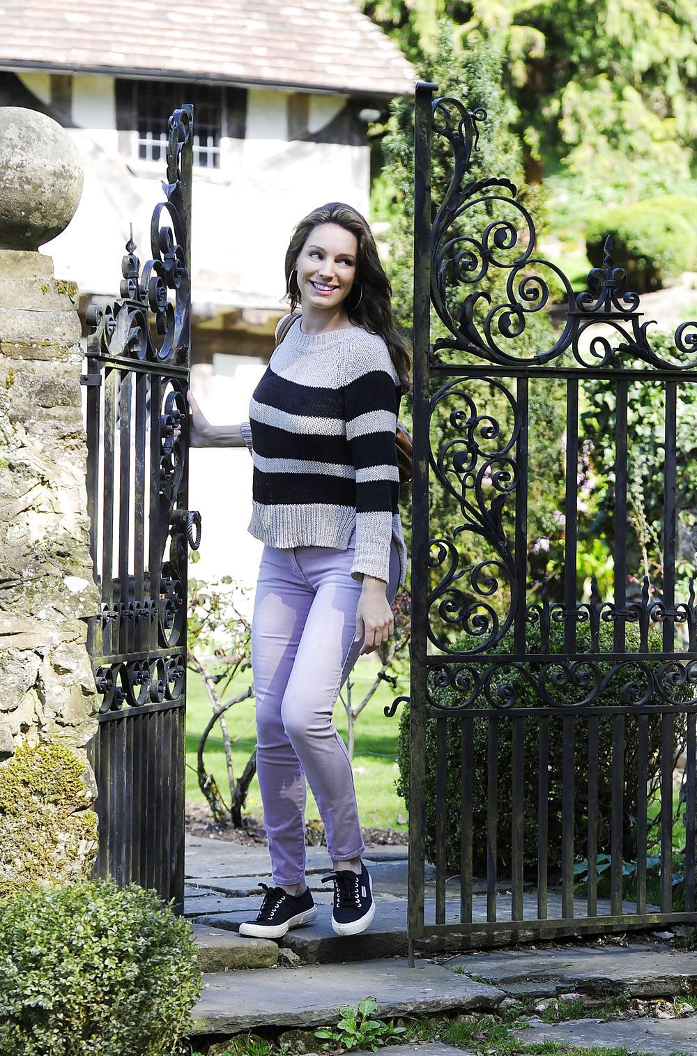 14P Pregnant Kelly Brook out and about in pink jeans London