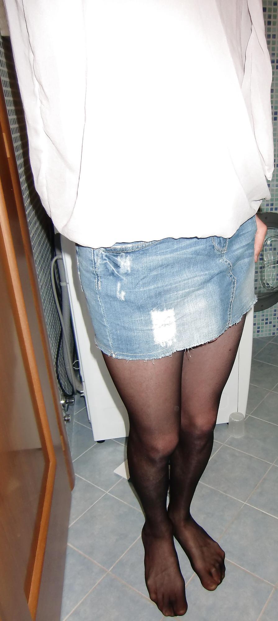 7P Marta shemale in a denim skirt and stockings