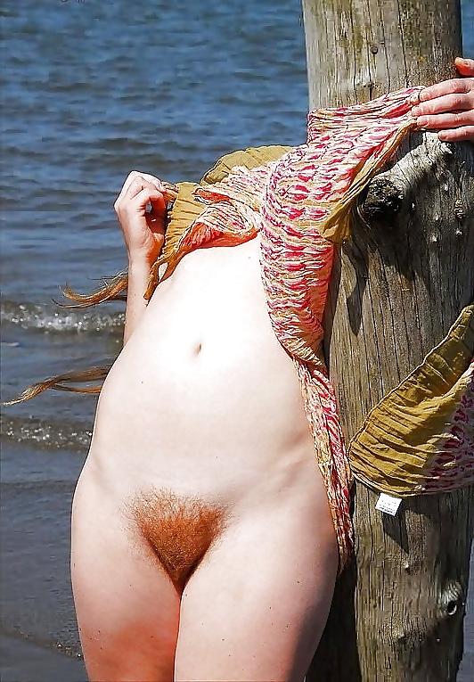 10P A beautiful delectable hairy pussy red head