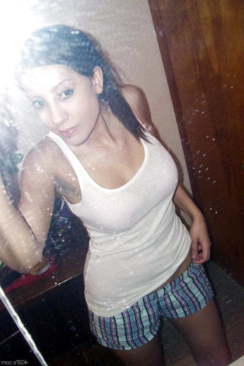 20P Sweet chick in front of a mirror.